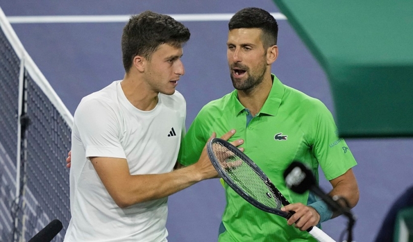 luca-nardi-and-novak-djokovic-after-their-match-1710228466.jpg