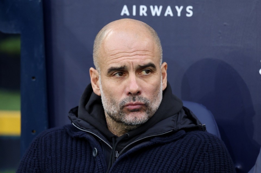 pep-guardiola-manager-manchester-city-795476051-1676389026.jpg