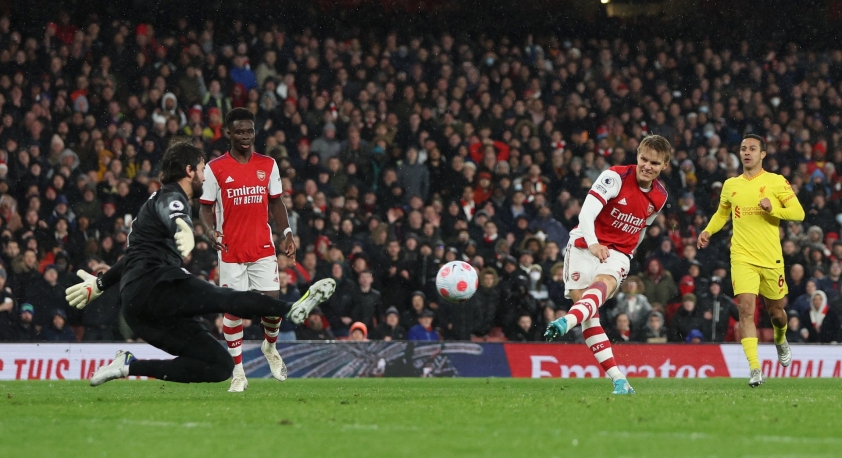 2022_03_16T212703Z_579789331_UP1EI3G1NL1R4_RTRMADP_3_SOCCER_ENGLAND_ARS_LIV_REPORT