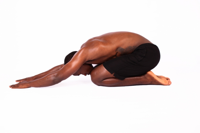 Fitness-man-doing-childs-pose-yoga