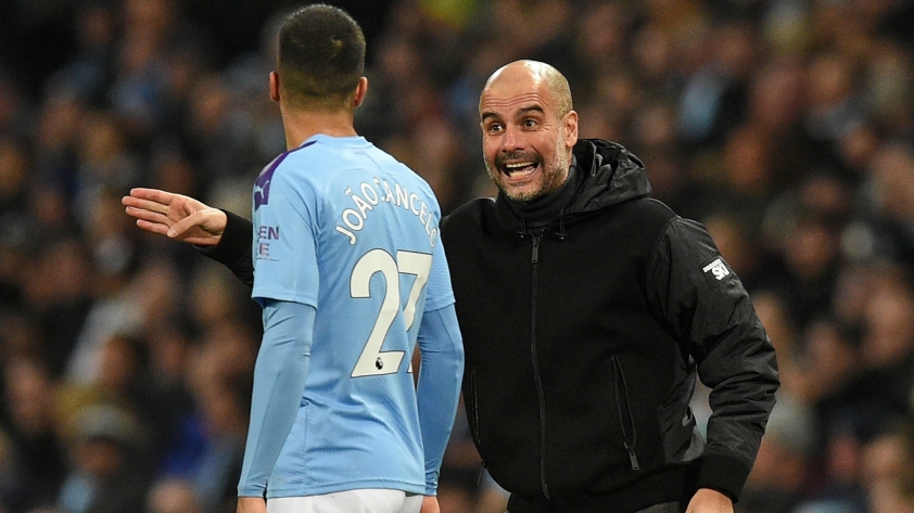 pep-guardiola-joao-cancelo-manchester-city-2019qtjyvbzys6ek1904pnol0o43y-16142141653571068605496-1614243792680-1614243792684849012177-1681211686.jpg