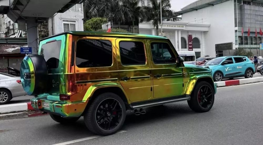 Mercedes-AMG G63 được đại gia Quảng Ninh tân trang với bộ áo 'tắc kè hoa' độc đáo 478702