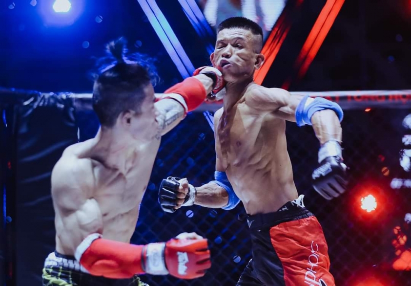 Phạm Văn Nam thắng nghẹt thở tại Cúp MMA Việt Nam 2021 97233