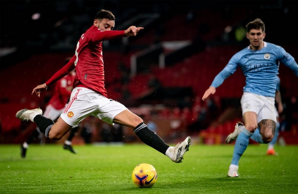 Man United cầm chân Man City trong trận cầu kịch tính Ảnh 1