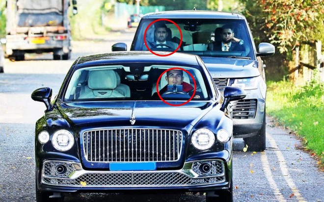 Ronaldo cầm lái Bentley Flying Spur dạo phố nhưng có 2 vệ sĩ đi kèm