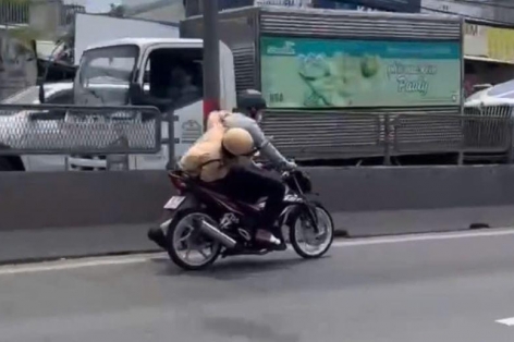 Tài xế bỏ chạy khiến CSGT bám víu sau xe máy: Hành vi nguy hiểm và bài học cảnh tỉnh