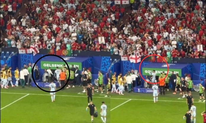 Ronaldo túm cổ áo, bực tức khi rời khỏi sân vận động