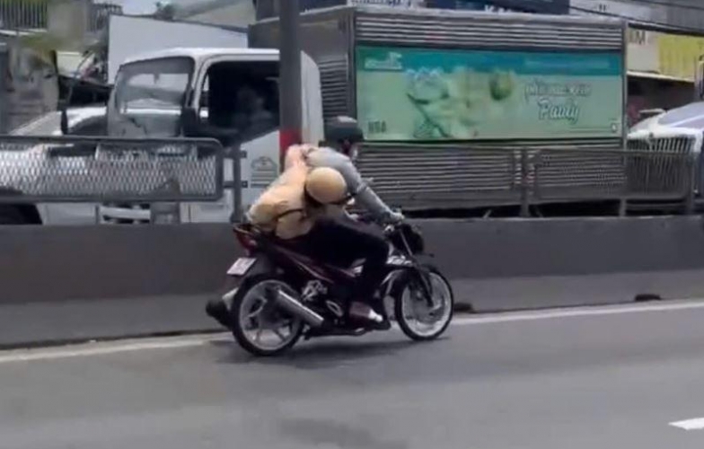 Tài xế bỏ chạy khiến CSGT bám víu sau xe máy: Hành vi nguy hiểm và bài học cảnh tỉnh