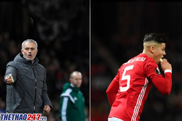 HLV Mourinho bóc chuối cho Rojo ăn
